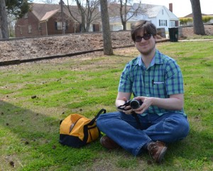 South Hill Enterprise reporter Chris Griggs sets up his camera to record a conversation in the park, South Hill, VA. 